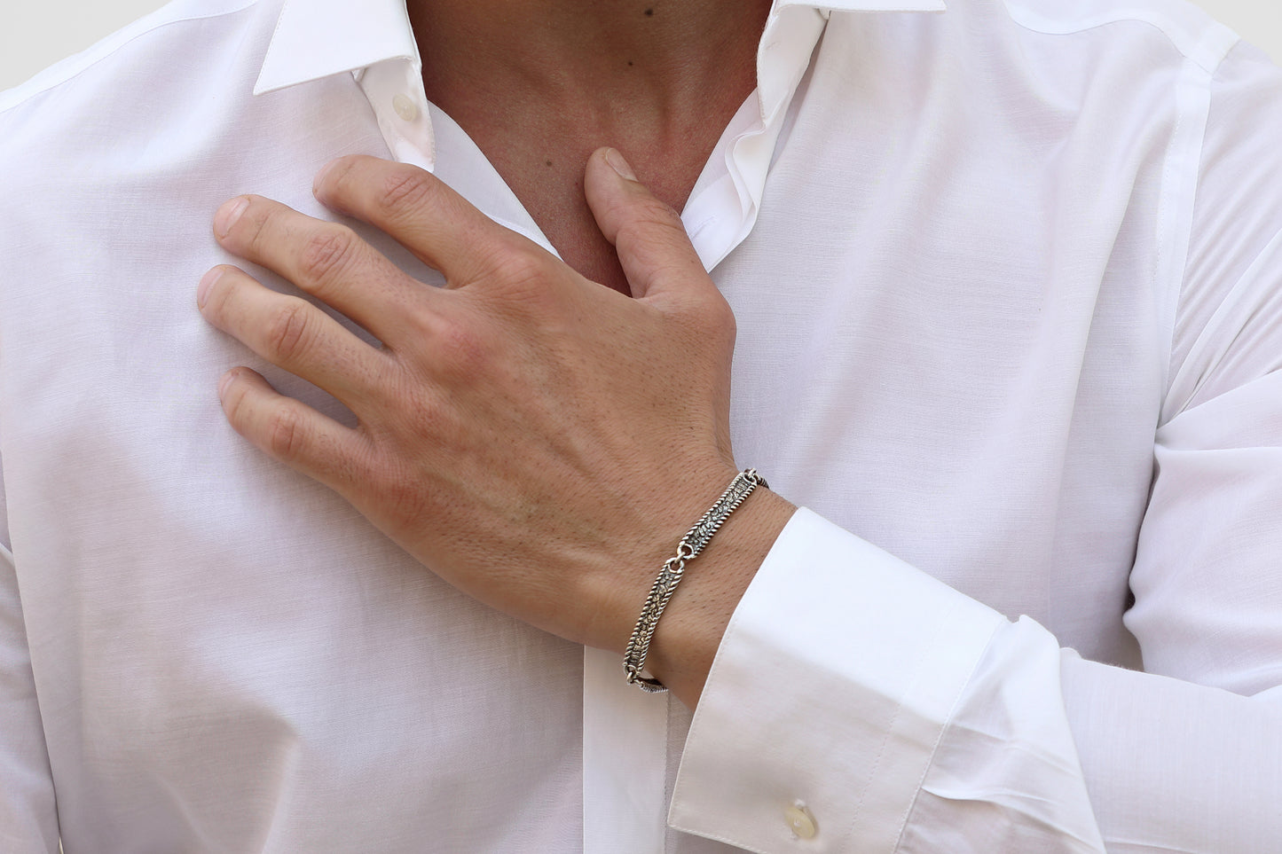 Bracciale Quattro Elementi agglomerato di figure con catena argento